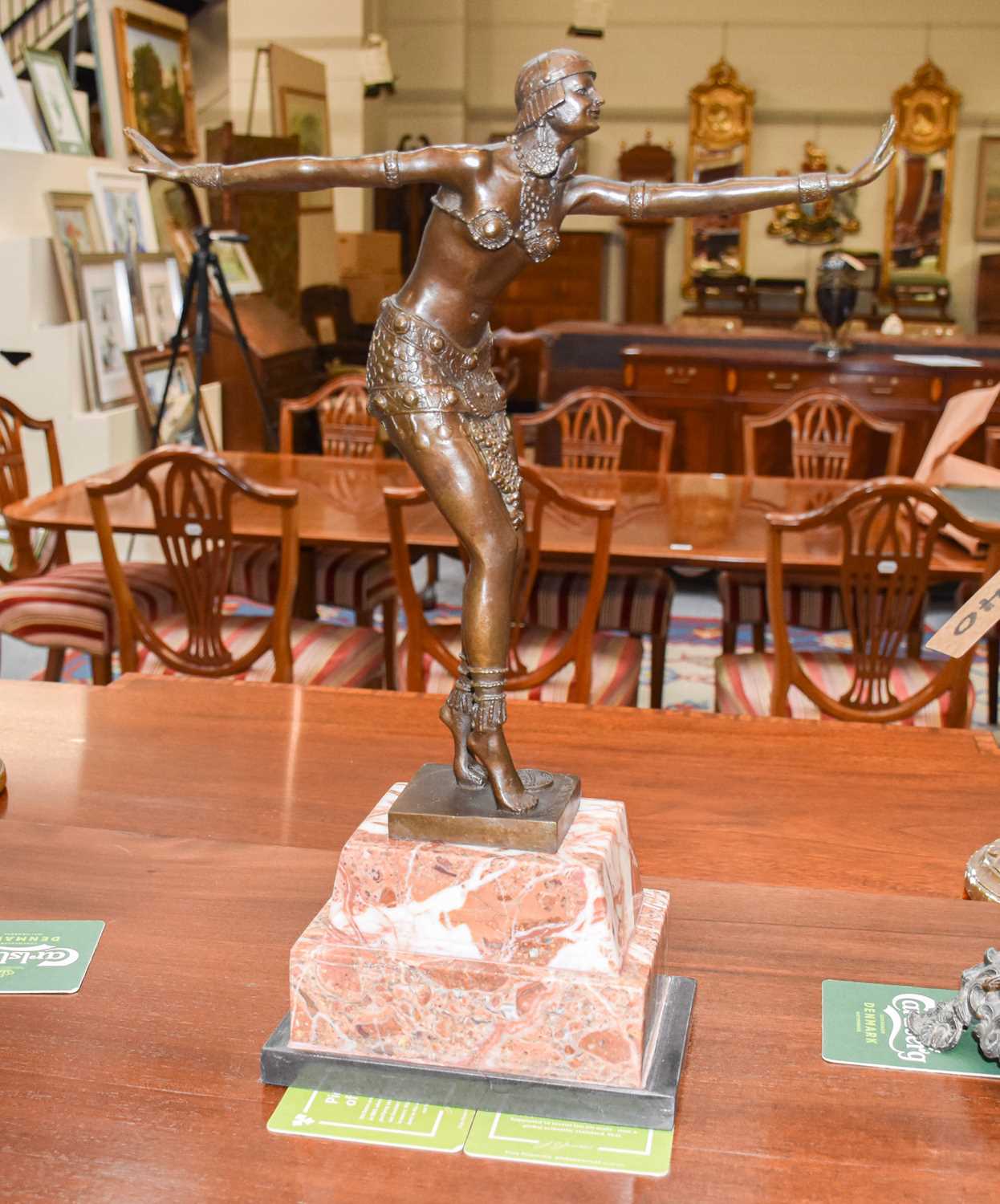 An Art Deco Style Bronze Figure, after Chiparus, raised on stepped variegated marble base, 48cm