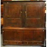 An 18th Century Oak Livery Cupboard, 150cm by 59cm by 179cm