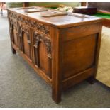 An Early 20th Century Carved Oak Three Panel Coffer, 108cm by 42cm by 58cm