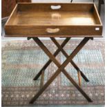 An Oak Butler's Tray on Folding Stand, 70cm by 46cm by 84cm; together with A Victorian Carved Walnut