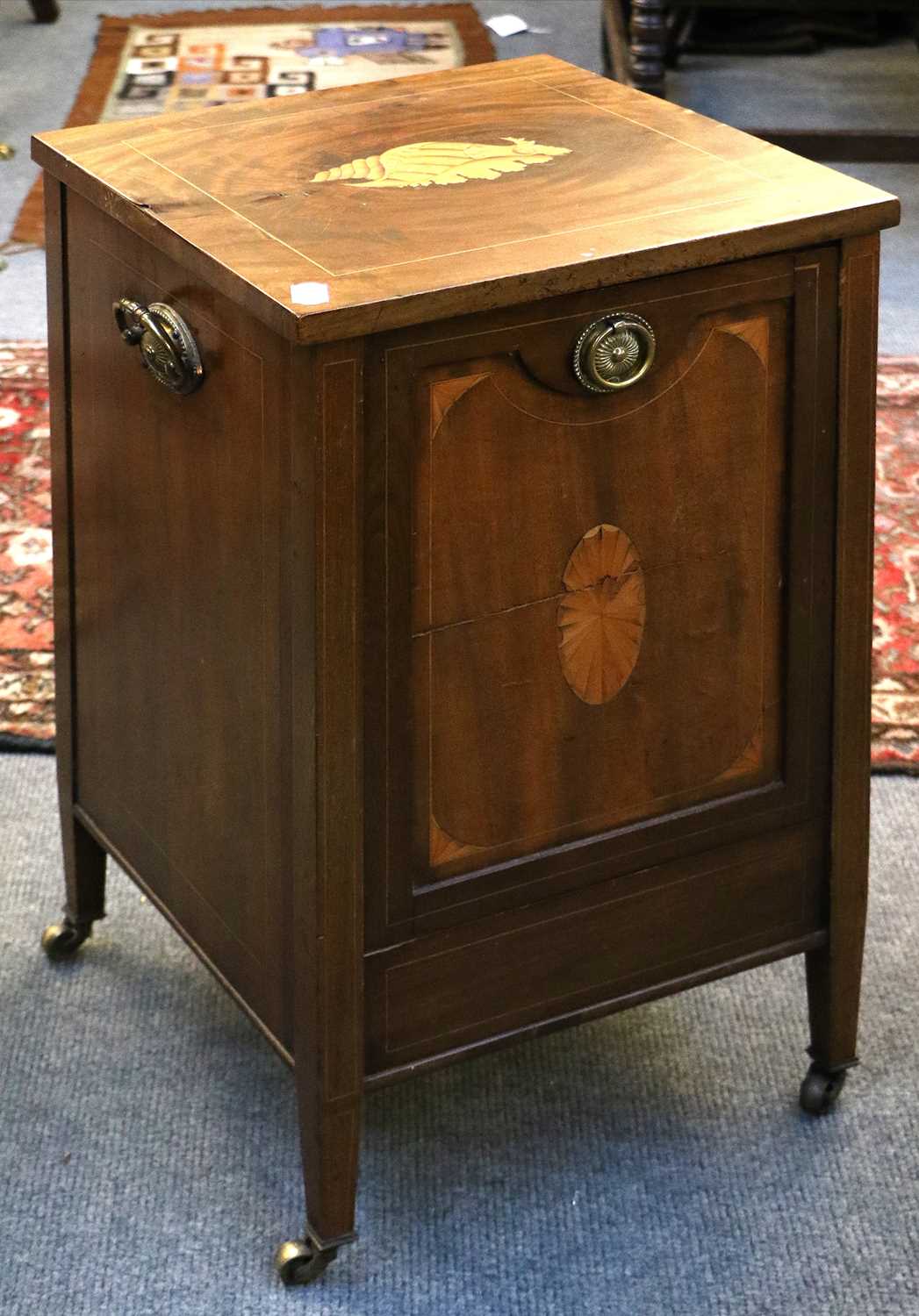 An Oak Standard Lamp, with tightly fluted column on acanthus supports, An Inlaid Mahogany Purdonium,