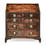 A George III Mahogany Bureau, late 18th century, the moulded fall front enclosing an arrangement