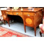 A George III Mahogany Inlaid Sideboard, with bow front, 208cm by 69cm by 89cm