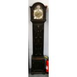 An Oak Chiming Small Longcase Clock, circa 1920, with a triple barrel movement chiming on gong rods,