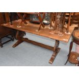 A Reproduction Oak Refectory Dining Table, 20th century, 182cm by 90cm by 73cm