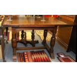 An Oak Work Table, 1st half 20th century, opening to reveal a fully fitted interior, on plain square