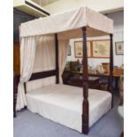 A Mahogany Four Poster Bed, part 19th century, with reeded and Gothic carved tapering supports on