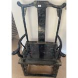 A Chinese Black Lacquer Parcel Gilt Alter Armchair, the top rail above a solid splat decorated