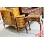 A Small Group of Reproduction Walnut Furniture, comprising: a serpentine front four height chest