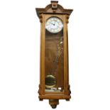 A Modern Vienna Type Double Weight Driven Striking Wall Clock and A Small Striking Oak Longcase