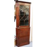 A George III Inlaid Mahogany Double Corner Cupboard, 80cm by 55cm by 215cmThe glazed door does not