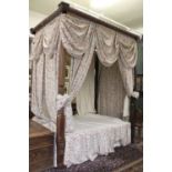 An Imposing Mahogany Four Poster Bed, the top rail rope-twist carved and with acanthus leaf carved