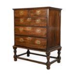 An Early 18th Century Oak and Pine-Lined Chest on Stand, the moulded top above two short and three