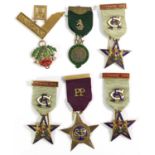 A Collection of Six South African Masonic Jewels, comprising a 9 carat gold Past Master's Jewel with