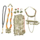 A Collection of Omani/Bedouin Jewellery, including a white metal necklace set with sixteen amber