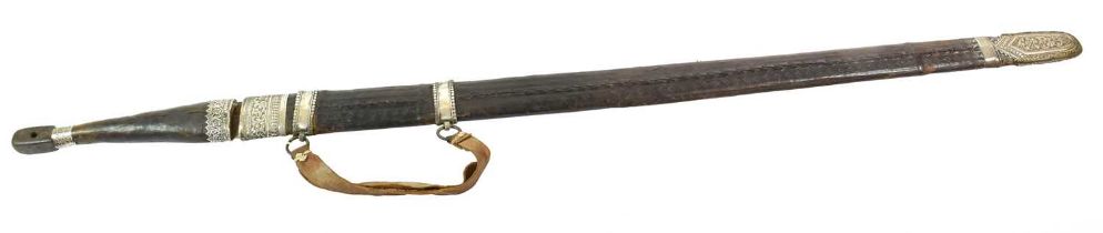 A 19th Century Omani Kattara, the 83cm double edge steel blade with three narrow fullers running for