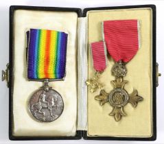An OBE Breast Badge (Civil), second type, in case of issue, with the miniature; a British War Medal,