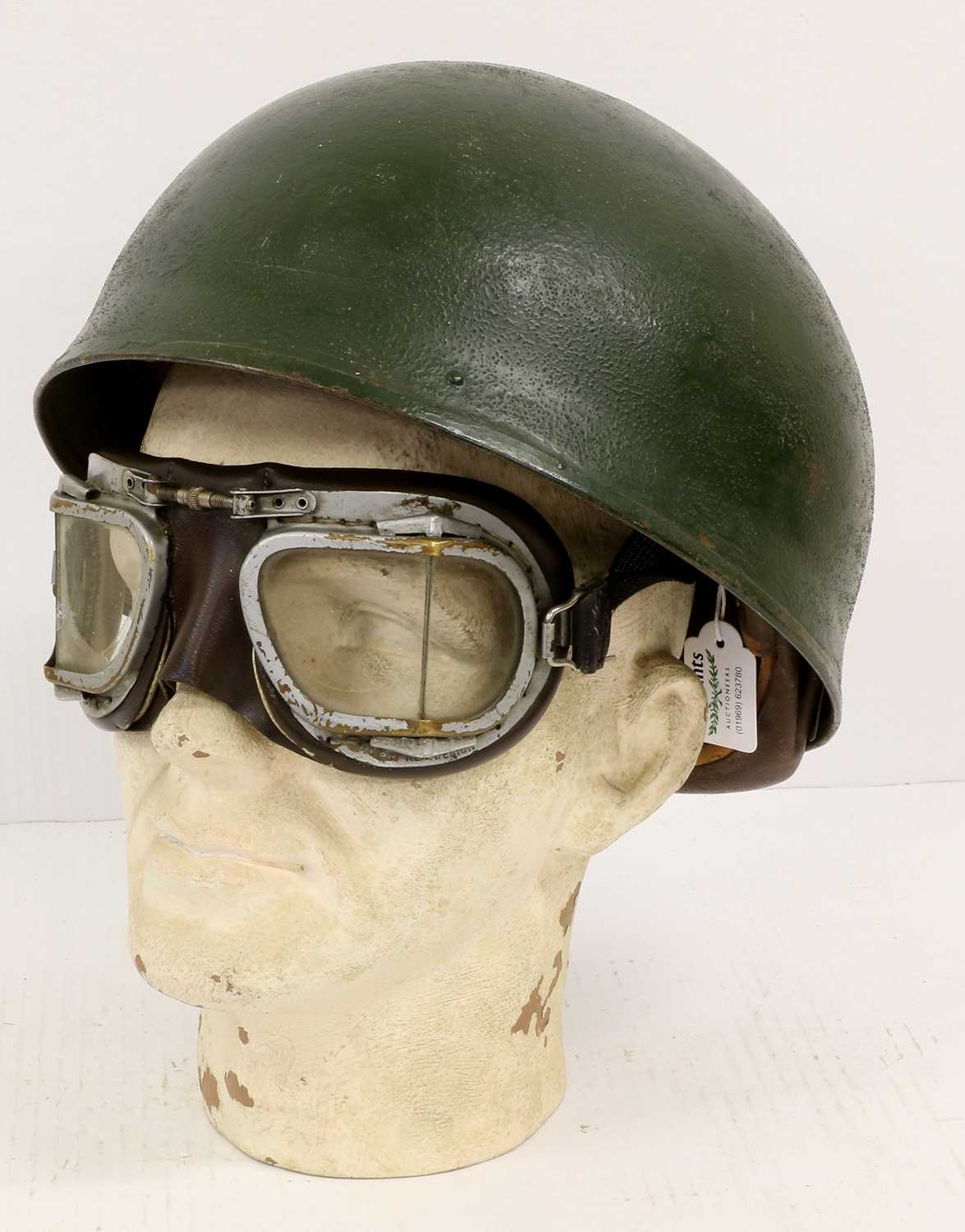 A Second World War Despatch Rider's Helmet, with dark green finish, felt padded liner, leather