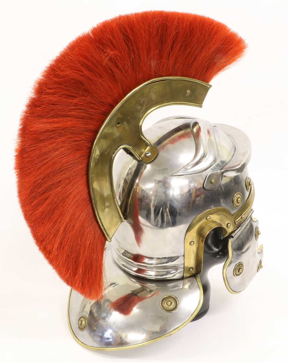 A Copy of a Roman Centurion's Helmet, in steel, with red horsehair and brass comb, brass edging - Image 2 of 2