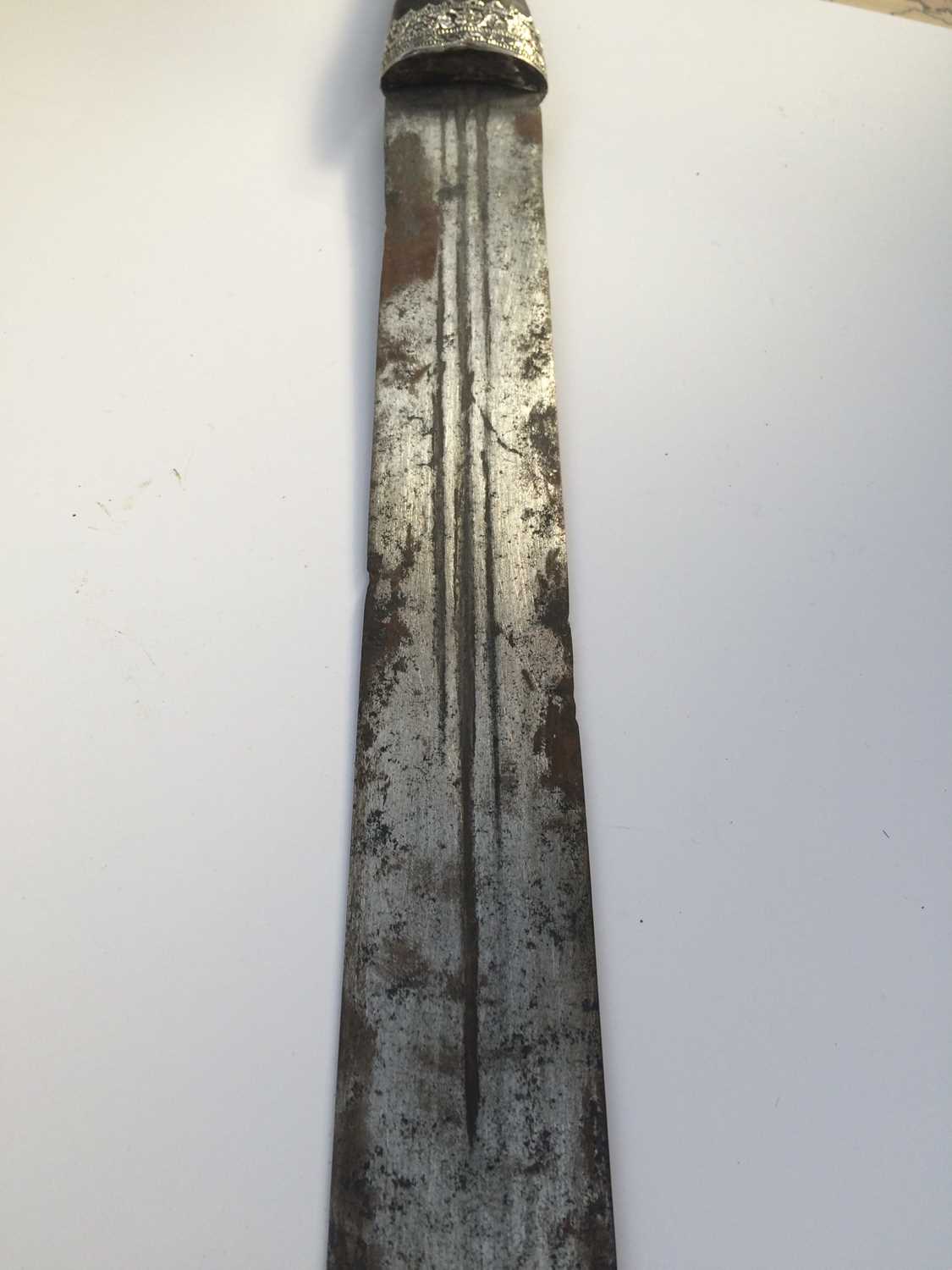 A 19th Century Omani Kattara, the 83cm double edge steel blade with three narrow fullers running for - Image 2 of 10