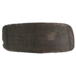 An Early 20th Century Kuba Ngandu Wicker Shield, Congo, of curved oblong form, the back set with a