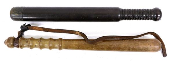A Victorian Ebony Police Truncheon, the weight brass head engraved VR/133, the lower section of