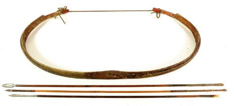 A 19th Century Indian Composite Bow, of curved horn, bearing traces of painted decoration in colours