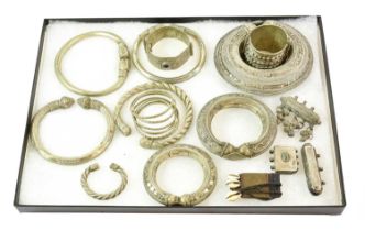 A Collection of Omani/Bedouin Silver and White Metal Jewellery, including five torque form