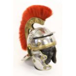 A Copy of a Roman Centurion's Helmet, in steel, with red horsehair and brass comb, brass edging
