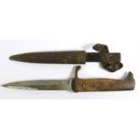 A First World War German Trench Knife, the 15cm single edge steel blade double edged for the last