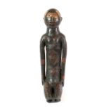 A Large Kouyou/Kuyu Dark Terracotta Fetish Figure, Kuyu River Region, N.W. Congo, seated with long