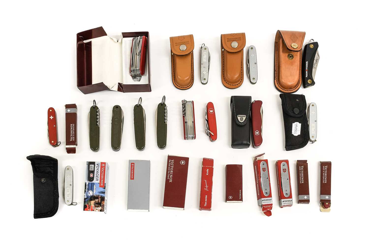 A Collection of Twenty Four Various Victorinox Swiss Army and Folding Pocket Knives, including