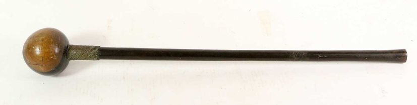 A Late 19th century Zulu Knobkerrie, of lignum vitae, with large globular head, the cylindrical haft