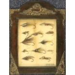 An Oak Framed display of Forty Two Salmon Flies