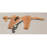 A Scarce Early American "Lasso Em Bill" Cowboy Cap Gun Set by Kenton