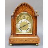 A German Mahogany Inlaid Quarter Striking Mantel Clock, circa 1900, the twin-barrel movement