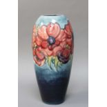 A Moorcroft Anemone VaseCrazed. 32cm high.