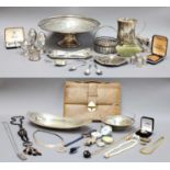 A Selection of Items Consisting of: a sterling silver oval dish, a small sterling silver basket,