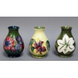 Three Walter Moorcroft Vases, Anemone and Hibiscus pattern