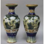 A Pair of Royal Doulton Vases, numbered 2009Vase one - large chip to the rim. Some paint