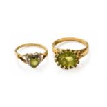A 9 Carat Gold Peridot and Diamond Cluster Ring, finger size K; and Another Peridot Cluster Ring,