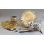 Two George III White Metal Toddy Ladles, with whale bone handles, A Pair of Gilt Bottle Coasters,