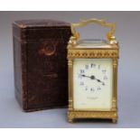 A Brass Carriage Timepiece, retailed by Thos Middlemass, Edinburgh, 16cm high (over handle), with