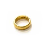 A 22 Carat Gold Band Ring, finger size LGross weight 12.7 grams.
