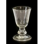 A Baluster Goblet, circa 1710, the rounded funnel bowl on a drop knop with air tear and folded