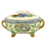 A Minton Majolica Game Pie Tureen, Cover and Liner, 1873, of basket-moulded oval form, the domed