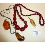 Cherry amber bakelite beaded necklace, and amber pendants