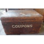 Large old pine box with painted letters reading "coupons"
