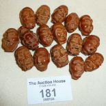 Antique Chinese carved hedaio nut heads x 14, with another buddha, etc.