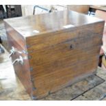 A mahogany box with two brass handles